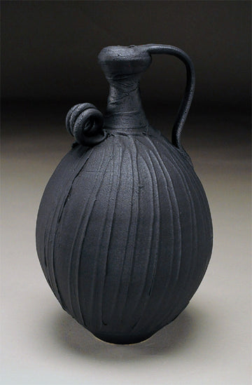 Carved Black Jug
