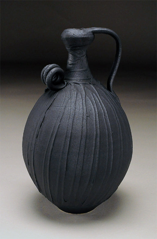 Carved Black Jug