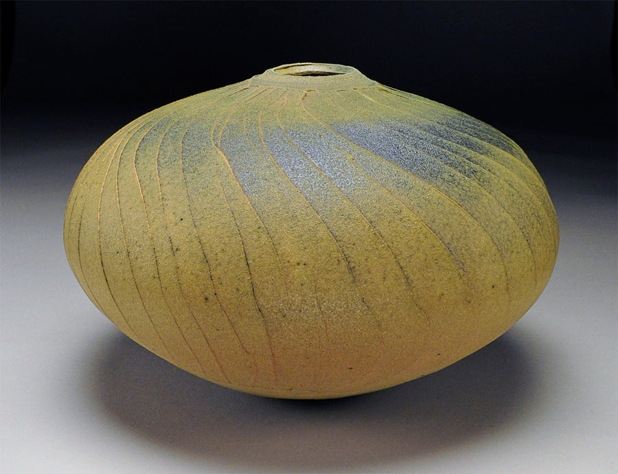 Yellowish Faceted Vessel